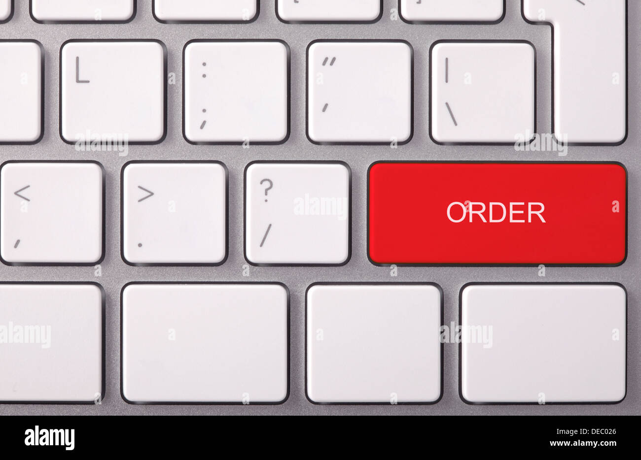 Laptop keyboard and red key 'ORDER' on it Stock Photo