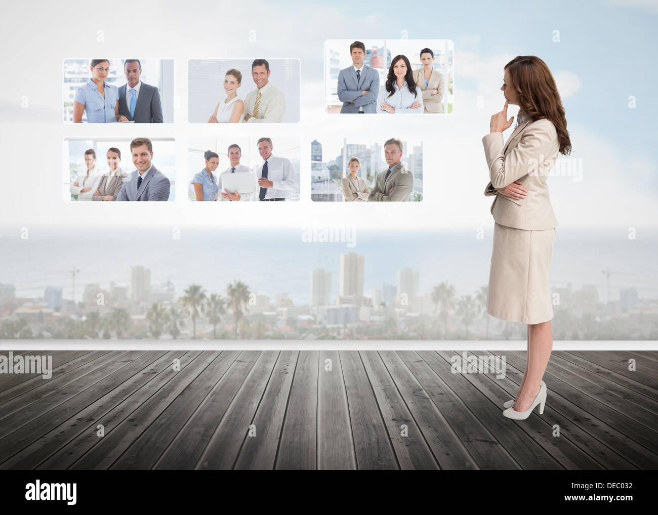 Businesswoman staring at futuristic interface Stock Photo