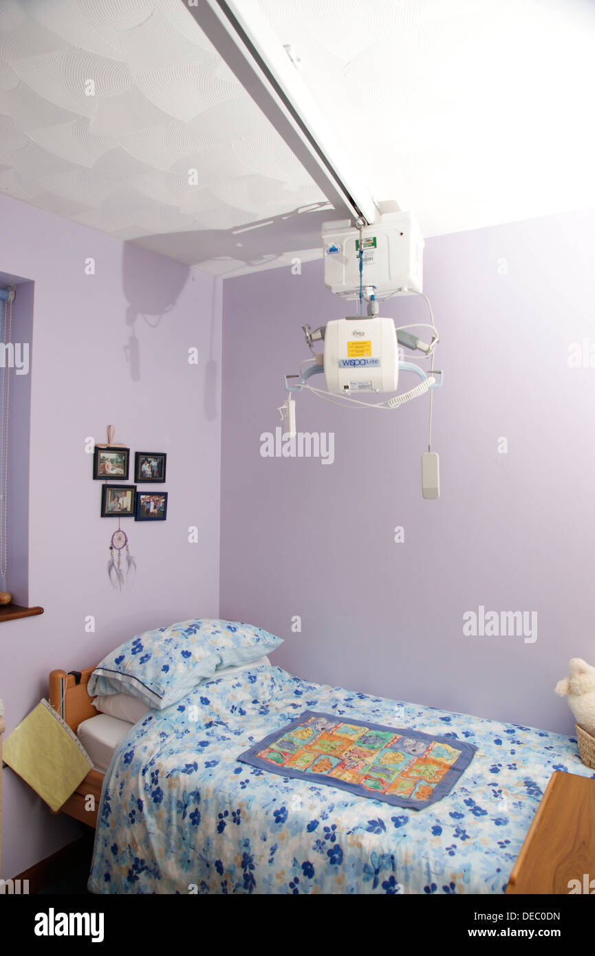 hydraulic hoist for helping a patient get out of bed Disability