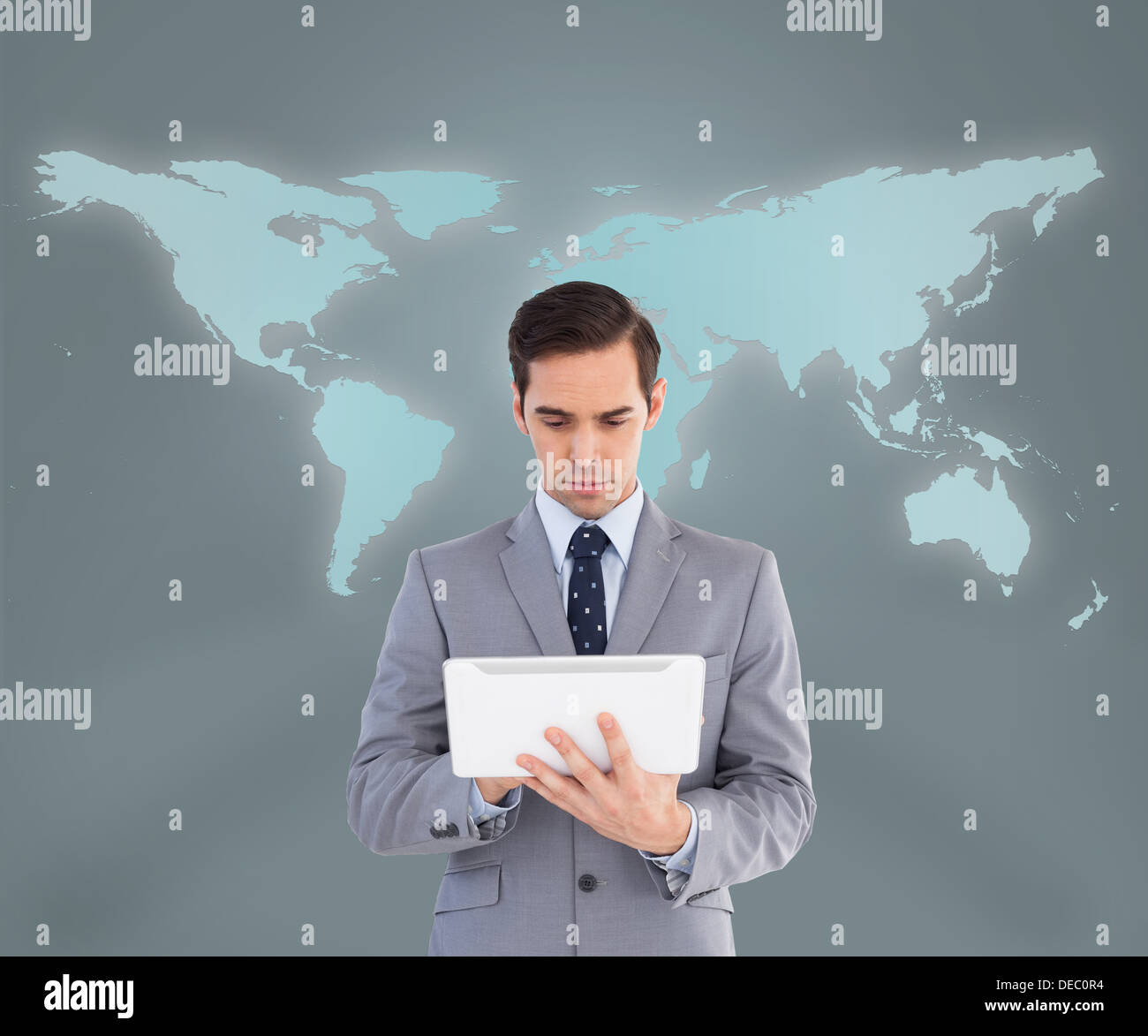 Businessman using his tablet computer Stock Photo