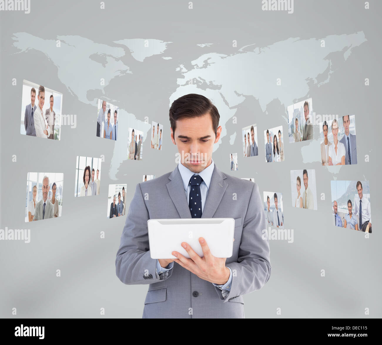 Businessman using his tablet pc Stock Photo