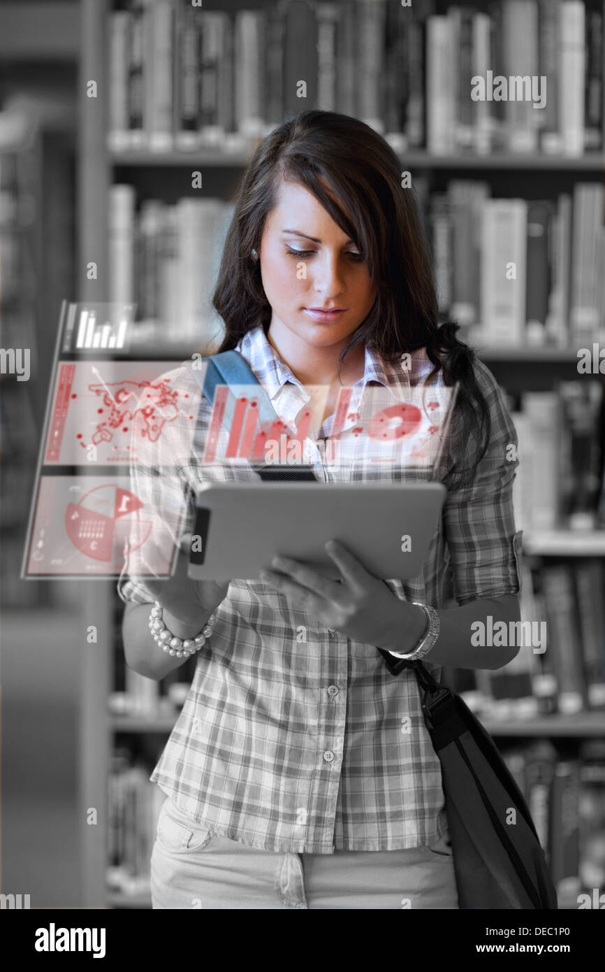 Cute student working on her digital tablet computer Stock Photo