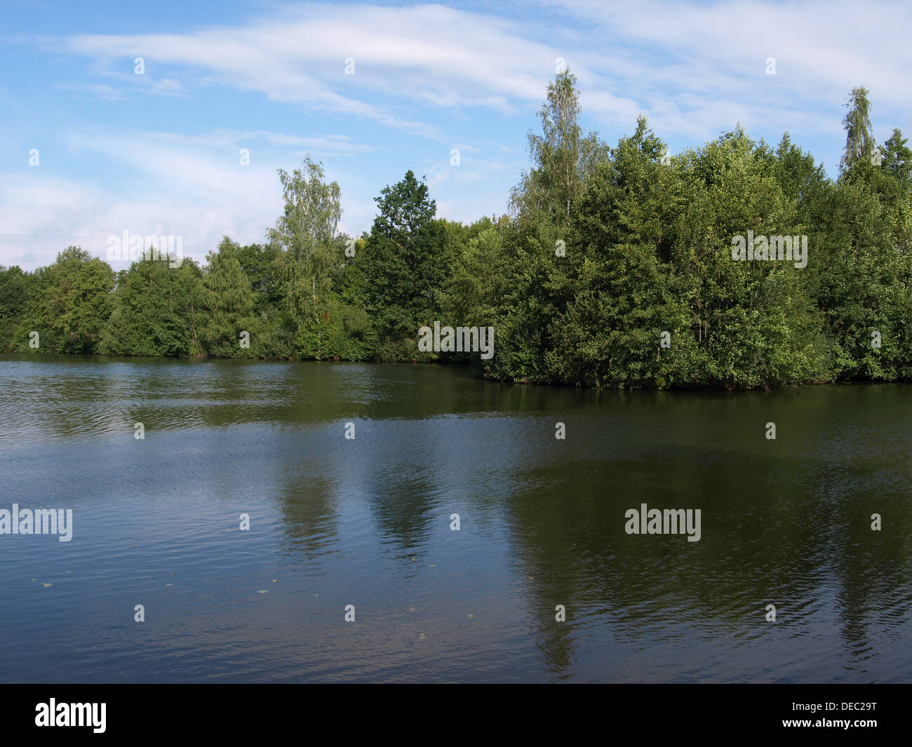 lake with riverine vegetation in Bavaria, Germany / See mit Uferbewuchs in Bayern, Deutschland Stock Photo
