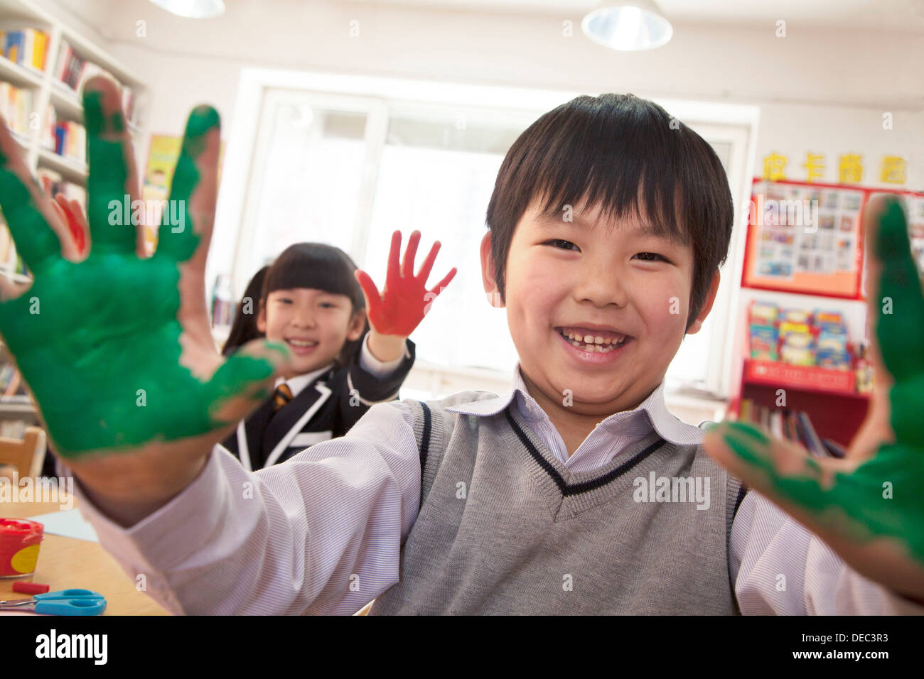Children hands up school uniform hi-res stock photography and images ...