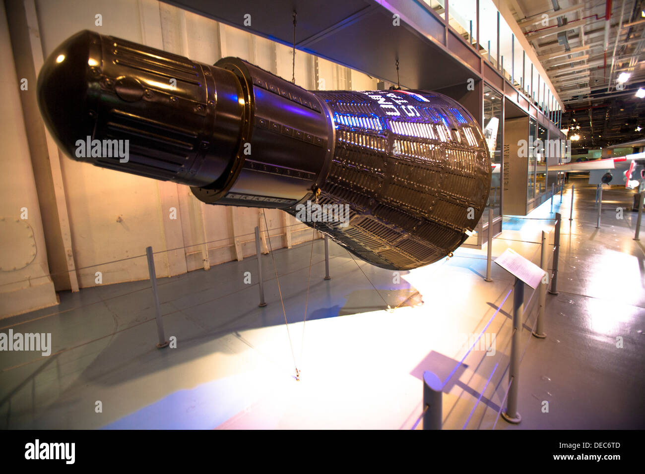 Aurora 7 Mercury capsule replica in the hangar of the Intrepid Sea, Air & Space Museum Stock Photo