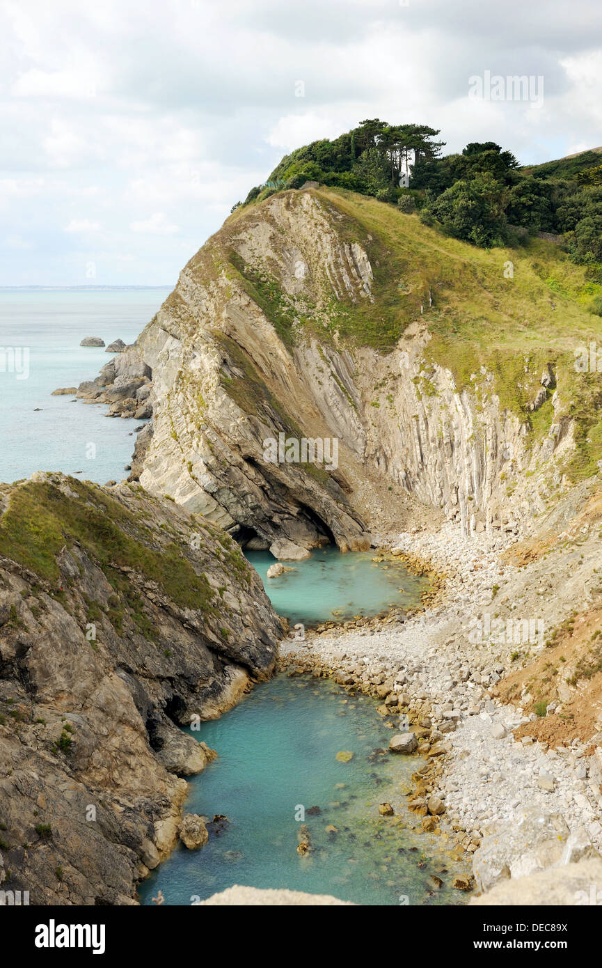 Rock formations and inlets on the Jurassic coast at Lulworth Cove, Dorset, Stock Photo