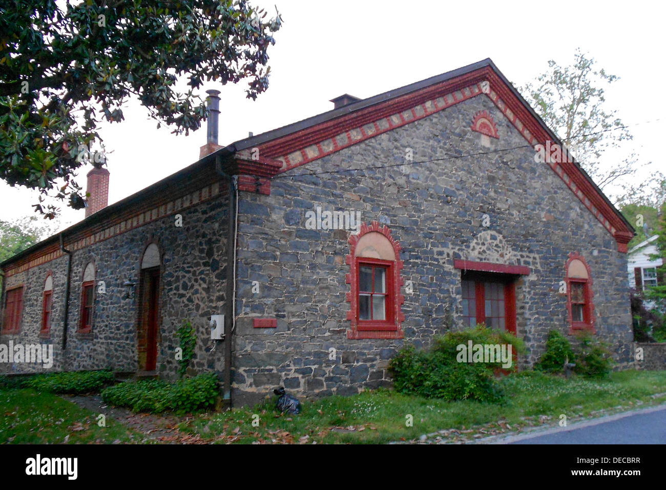 Old Mill with 1879 datestone in the Dickeyville Historic District on the NRHP since July 12, 1972 On Pickwick and Weathedsville Stock Photo