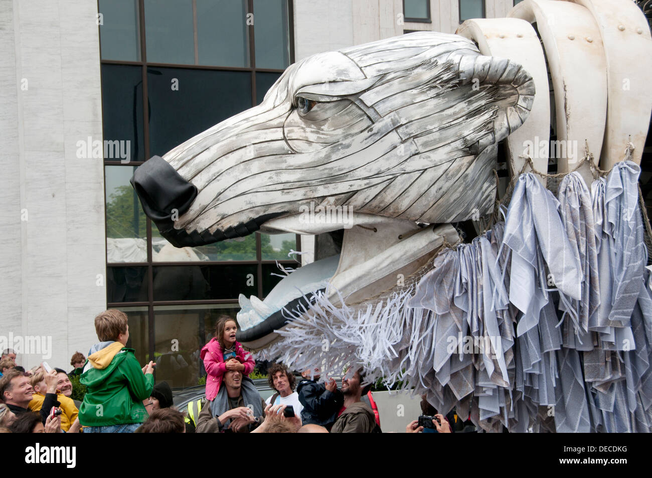 Aurora, the double-decker-bus-size polar bear puppet commissioned by Greenpeace to lead an Arctic-inspired street parade Stock Photo