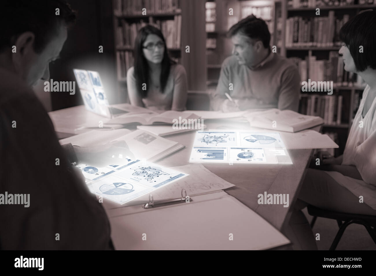 Serious mature students working on their digital tools Stock Photo