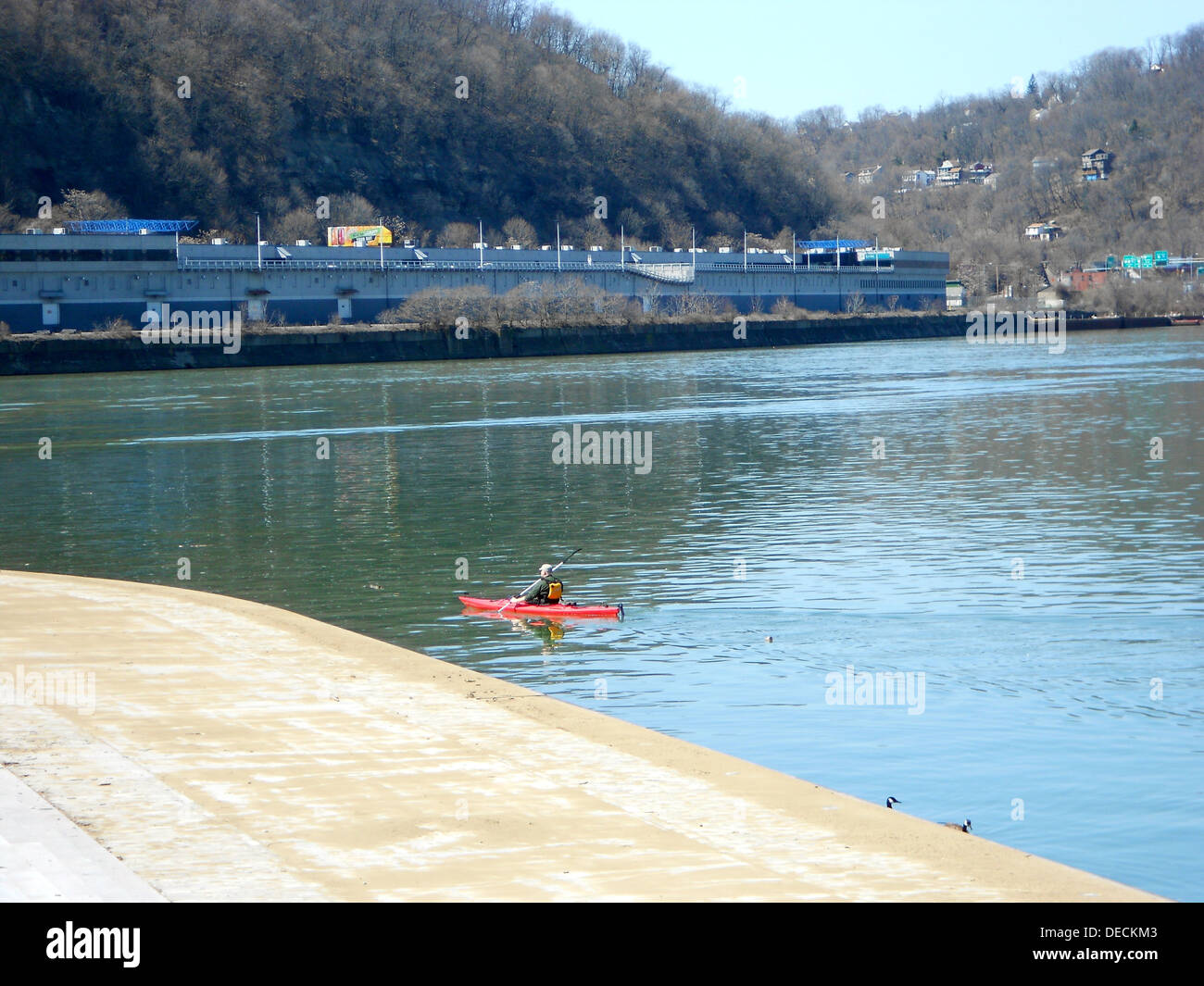 Canoer on the Allegheny River in Pittsburgh near the confluence with the Monongahela River at the Forks of the Ohio (Point Stat Stock Photo