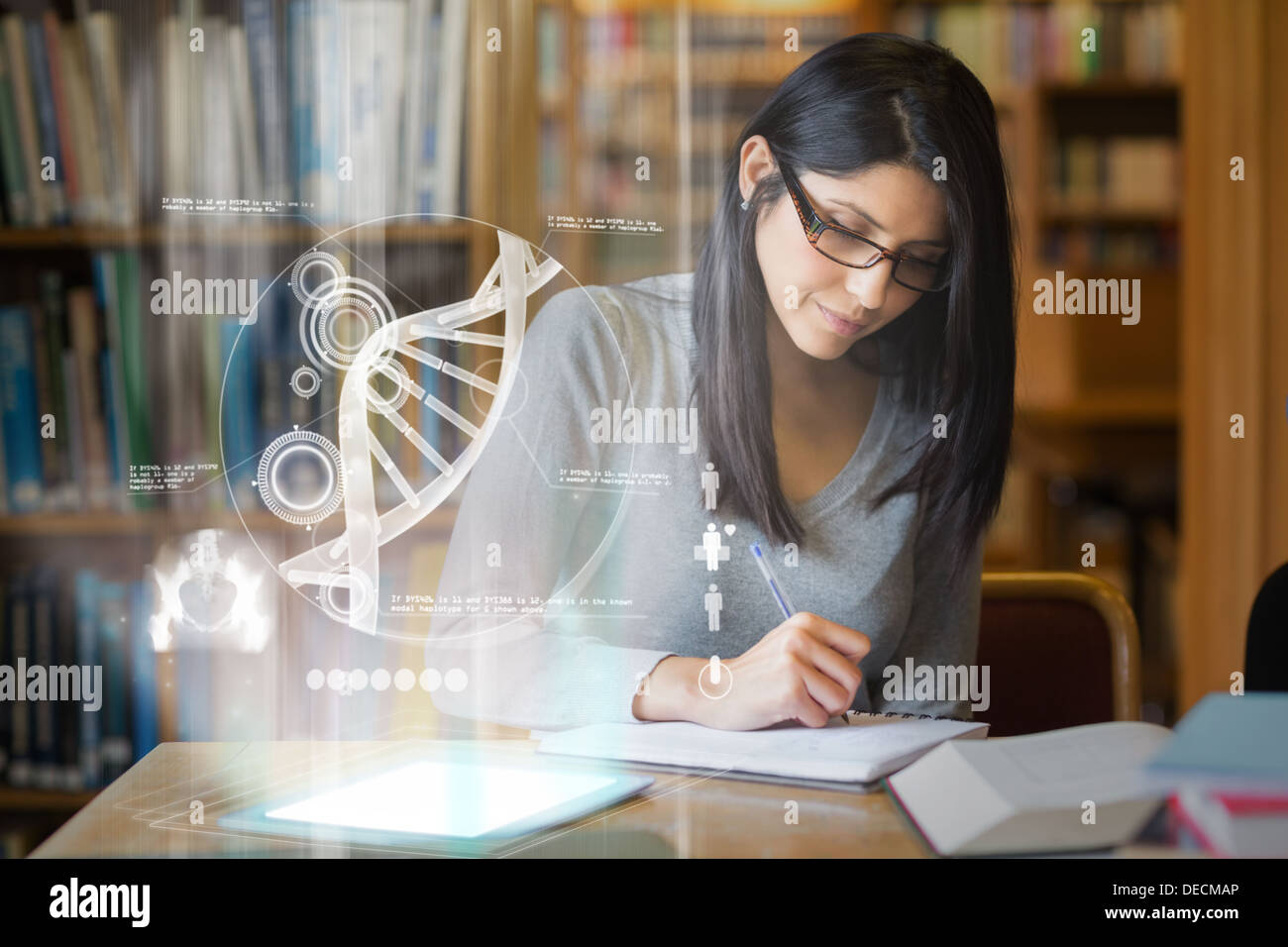 Focused mature student studying medicine on digital interface Stock Photo
