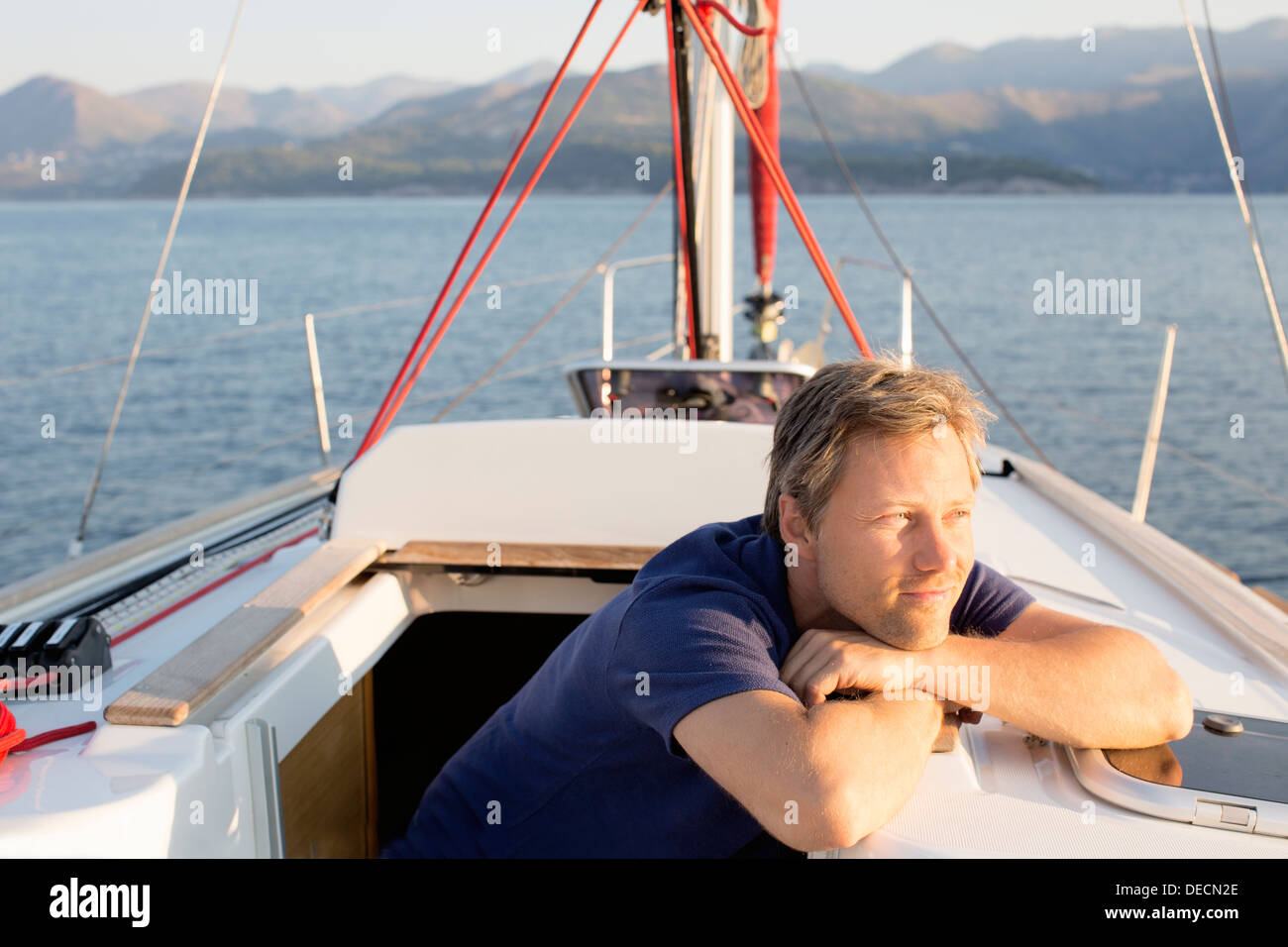 Man on bow sailing boat hi-res stock photography and images - Alamy