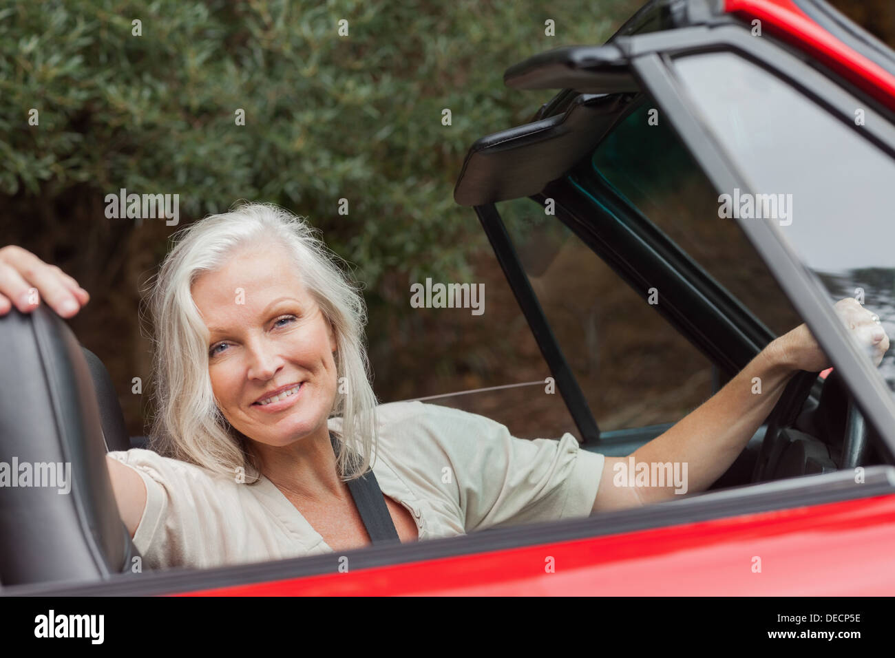 Mature woman posing for camera hi-res stock photography and images - Alamy