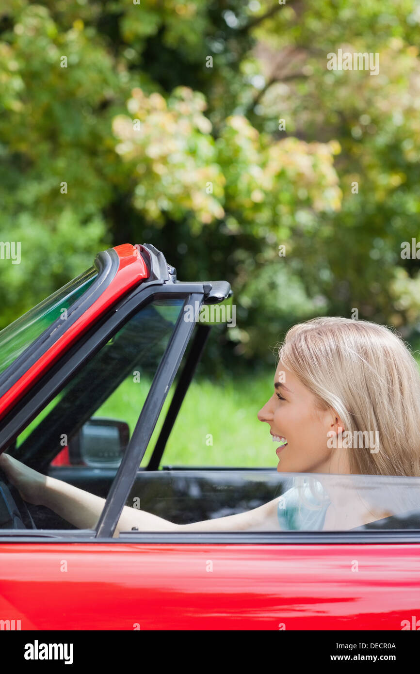 Woman driving red sports car hi-res stock photography and images - Alamy