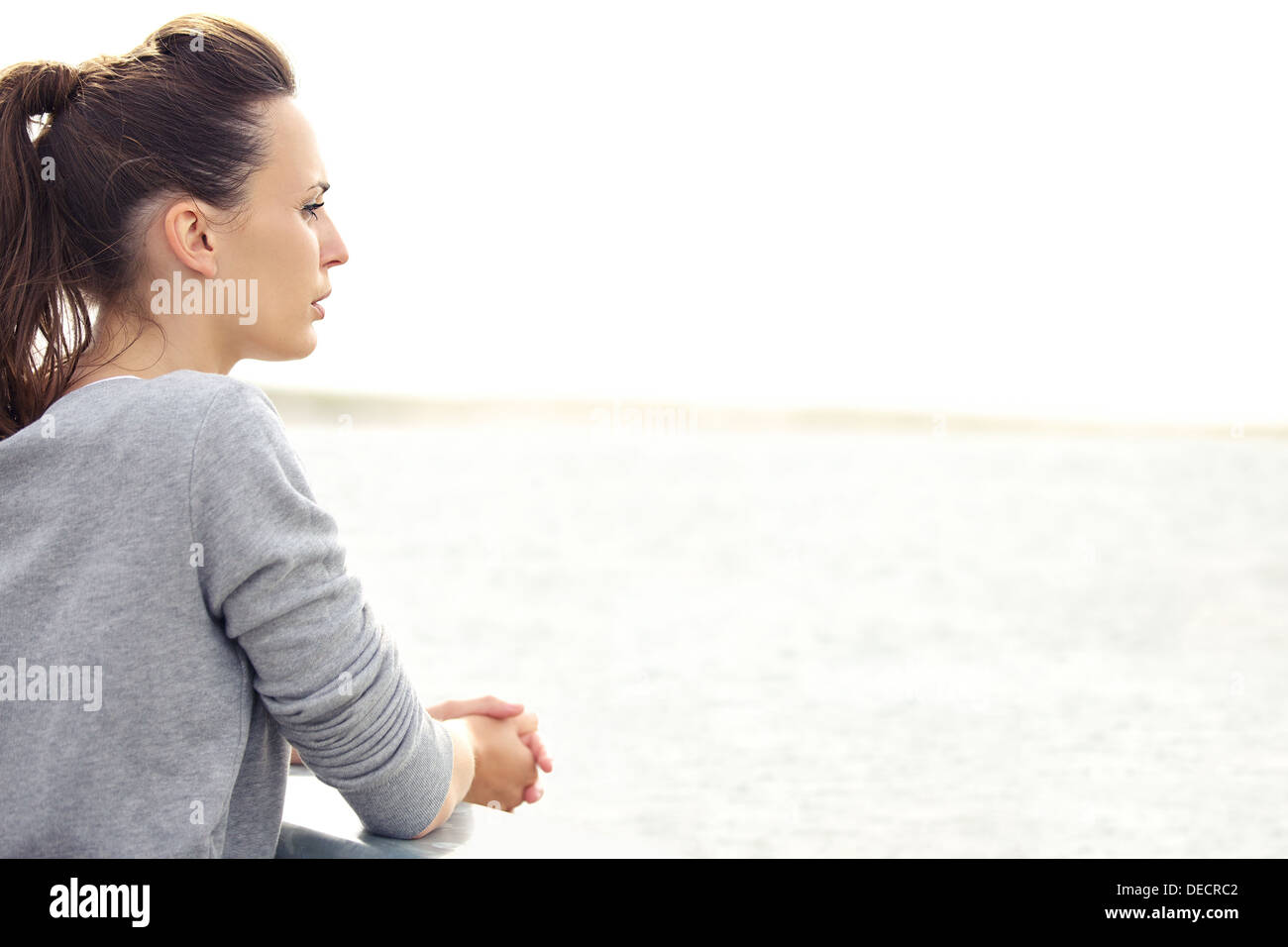 Woman thinking alone hi-res stock photography and images - Alamy