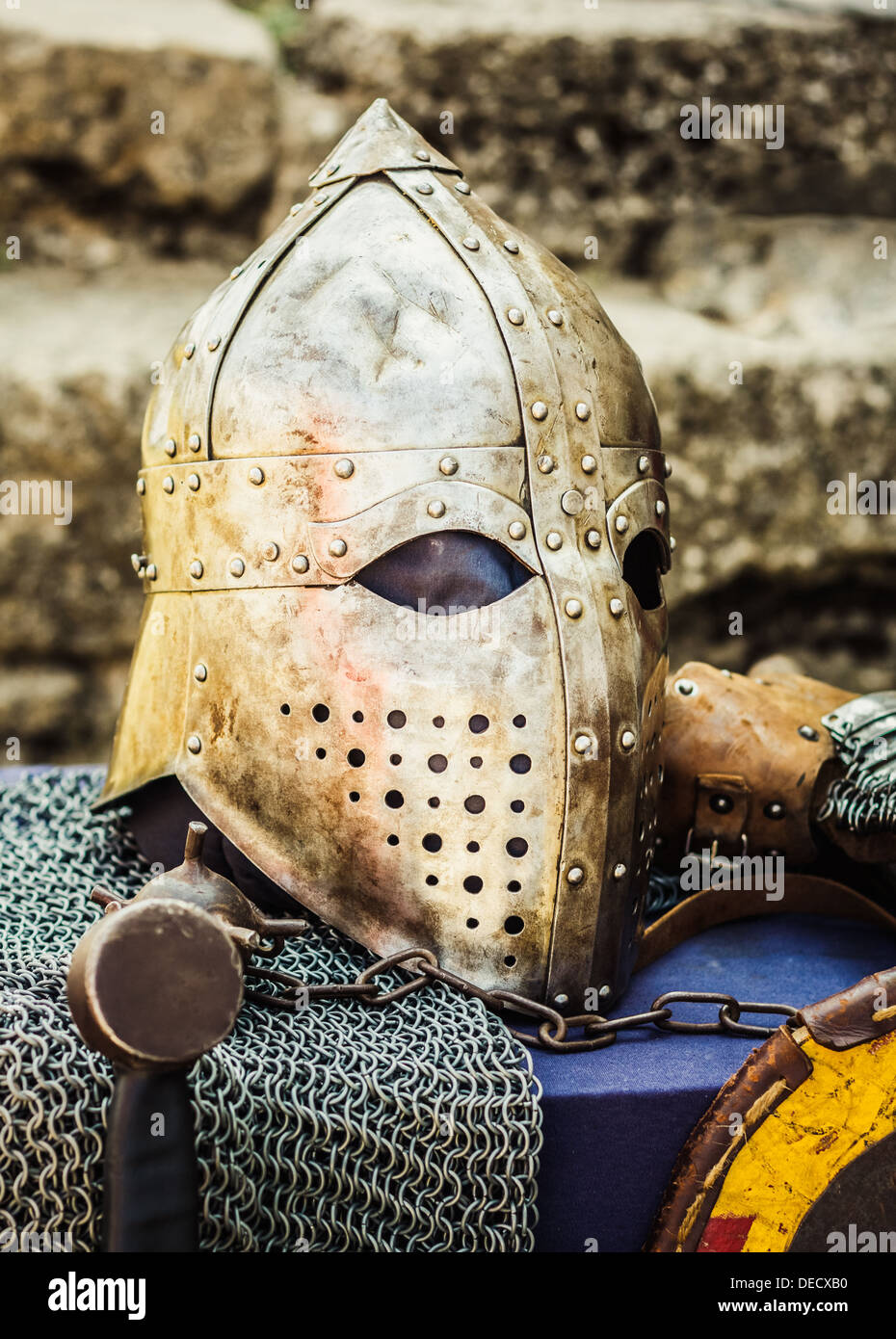 Protective helmet with a visor on medieval knight. Medieval Templar helmet waiting for knight Stock Photo