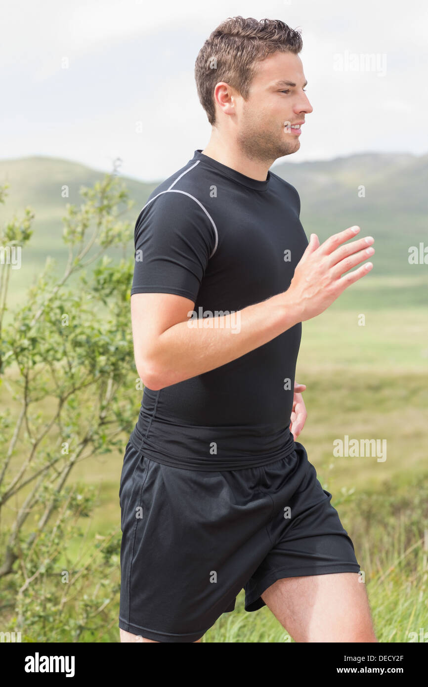 Athletic man on a jog Stock Photo