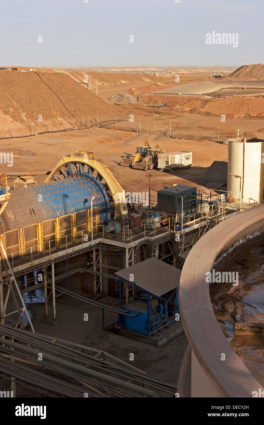 From carbon in leach plant to ball mill and water ponds, on open pit surface gold mine processing plant, Mauritania, NW Africa Stock Photo