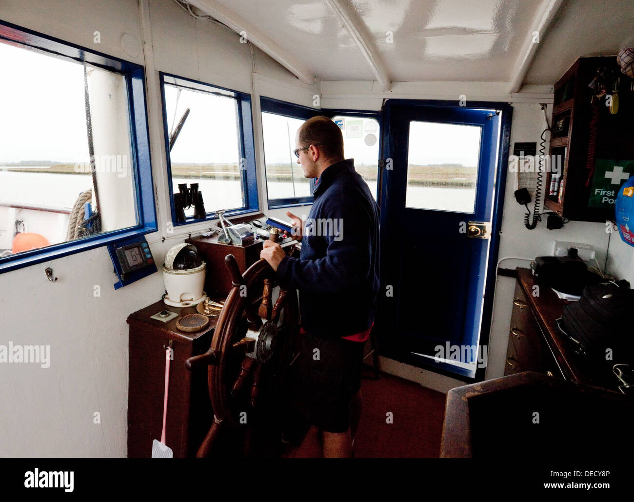 Boat captain steering his ship in the control room, the Lady Florence