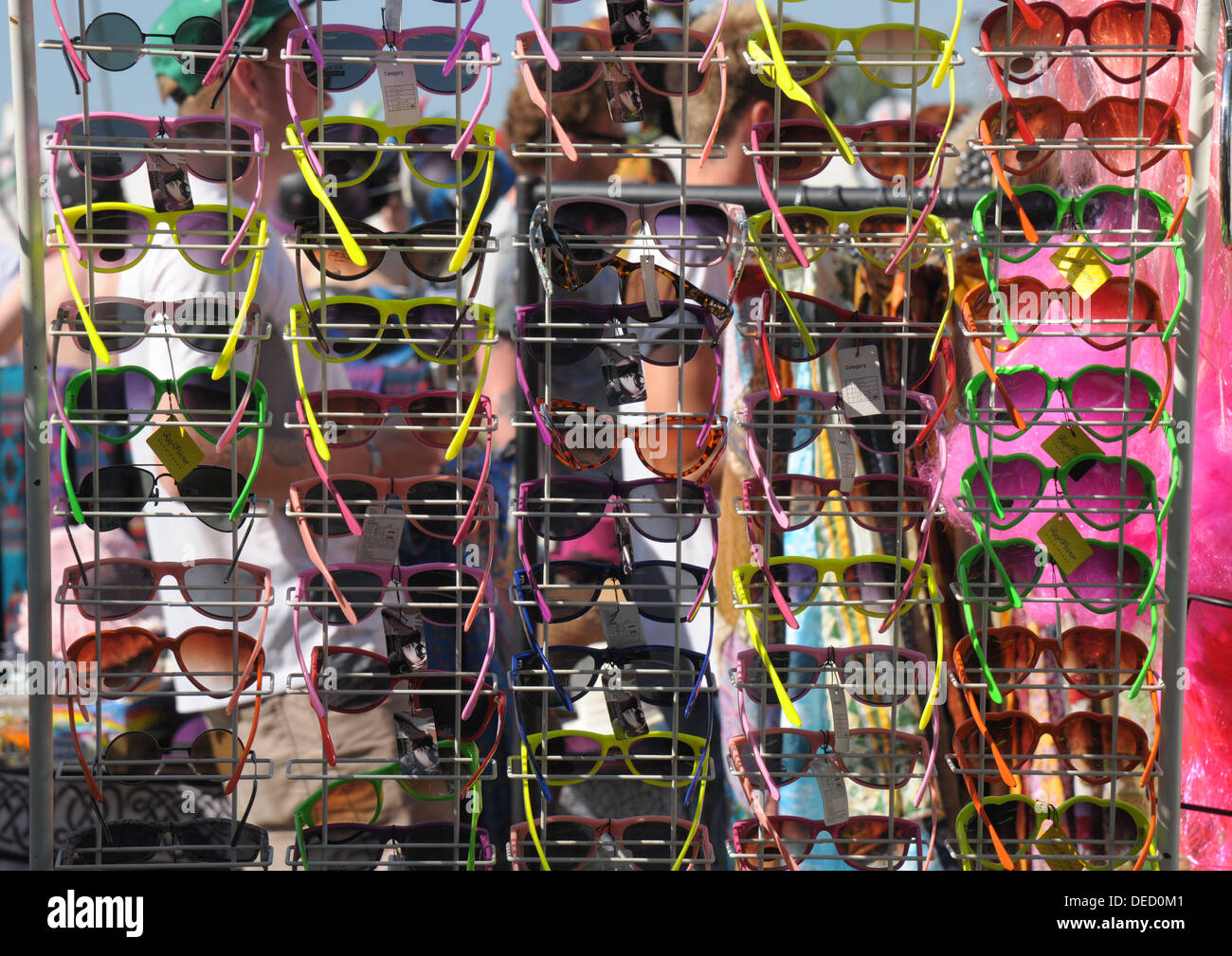 A market stall display of multicolour sunglasses. Stock Photo