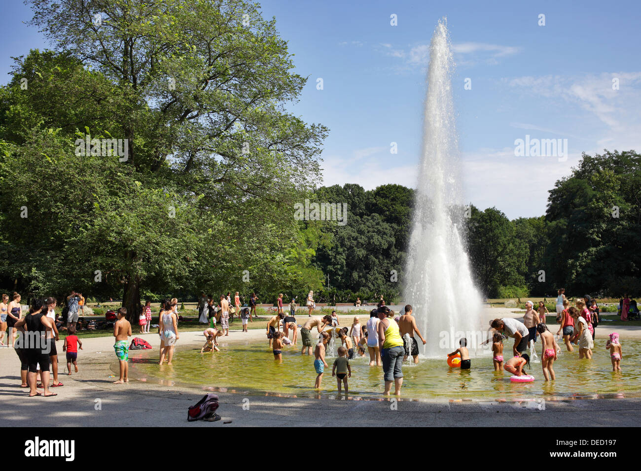 Berlin, Germany, kids splash in the Fontaene in Treptow Park Stock Photo