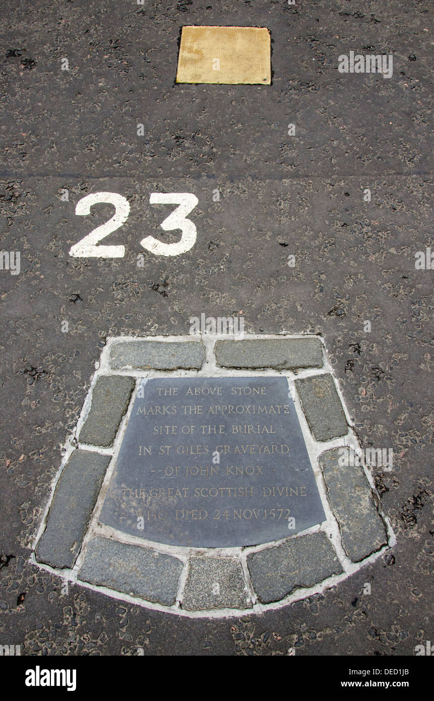 A plate marking the grave of john Knox in the car park behind St Giles Cathedral in Edinburgh. Stock Photo