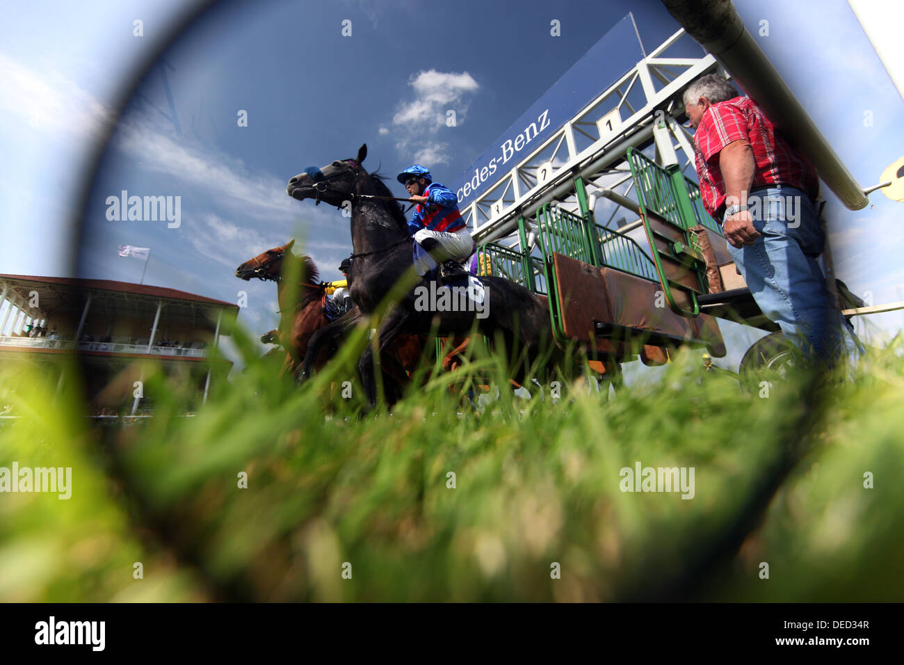 Iffezheim, Germany, horses and jockeys before the start of a horse race Stock Photo