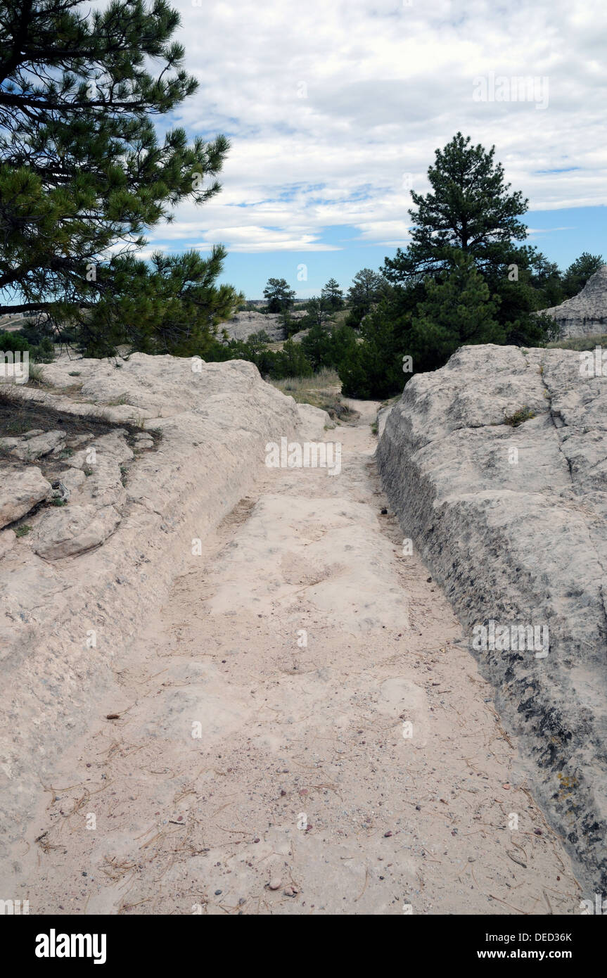 Oregon Trail ruts near Guernsey, WY, a National Historic Monument. The ruts mark the passage of countless pioneers and settlers. Stock Photo
