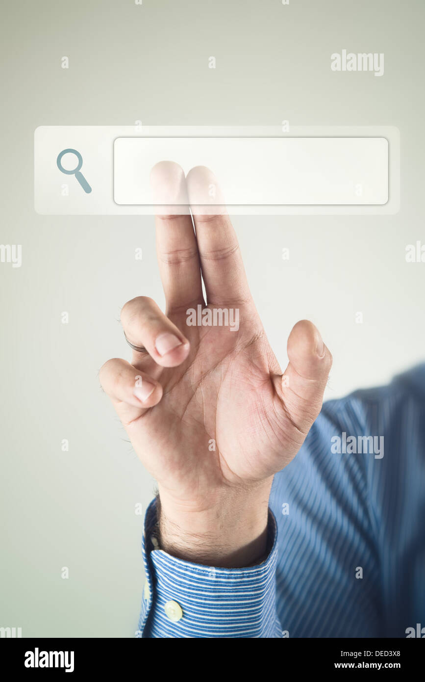 Businessman hand clicking internet search page on computer touch screen Stock Photo