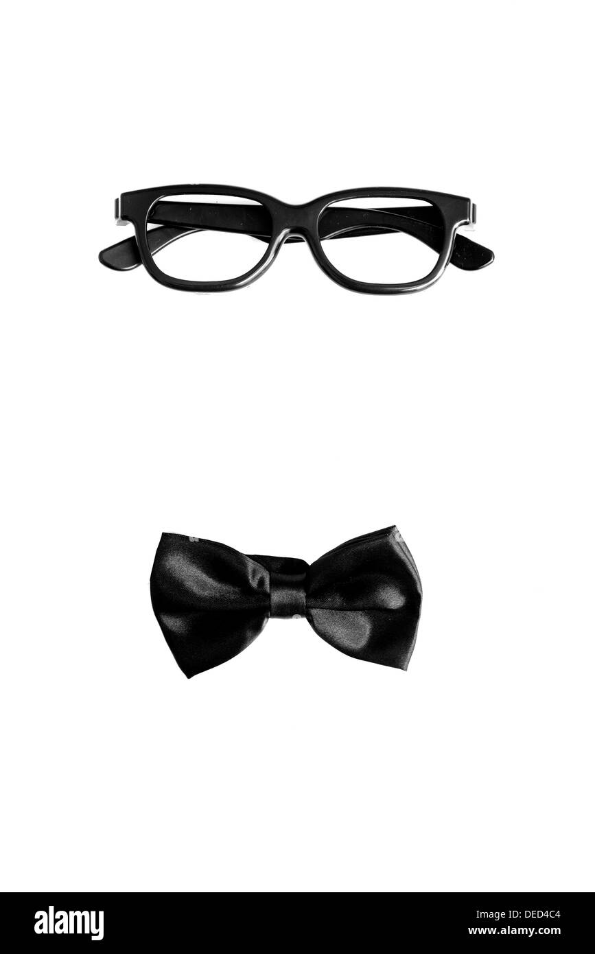 Eye glasses and bow tie on white background Stock Photo
