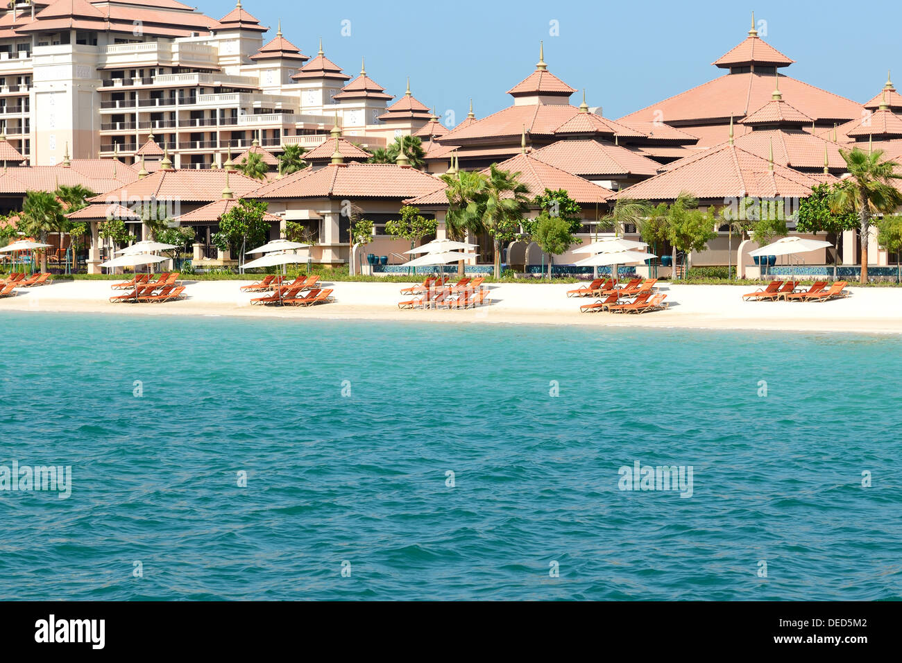 Beach of the luxury Thai style hotel on Palm Jumeirah man-made island, Dubai, UAE Stock Photo
