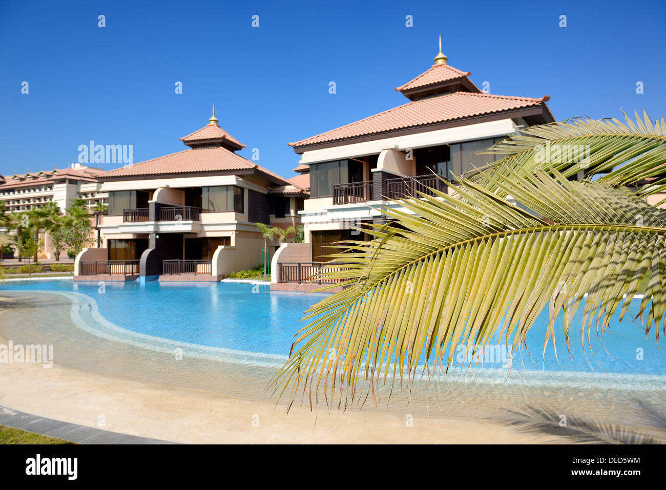 The luxury villas in Thai style hotel on Palm Jumeirah man-made island, Dubai, UAE Stock Photo