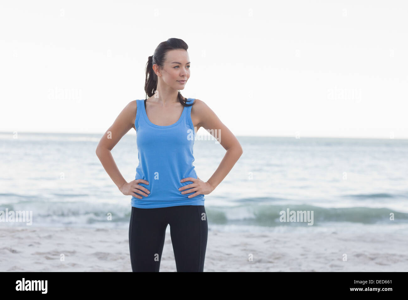 Woman standing in front of sea hi-res stock photography and images - Alamy