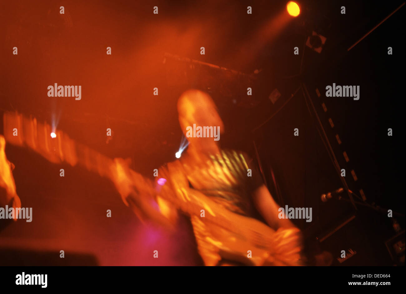 Blurred shot of a guitarist playing electric guitar at a rock music performance in Tel Aviv Israel Stock Photo
