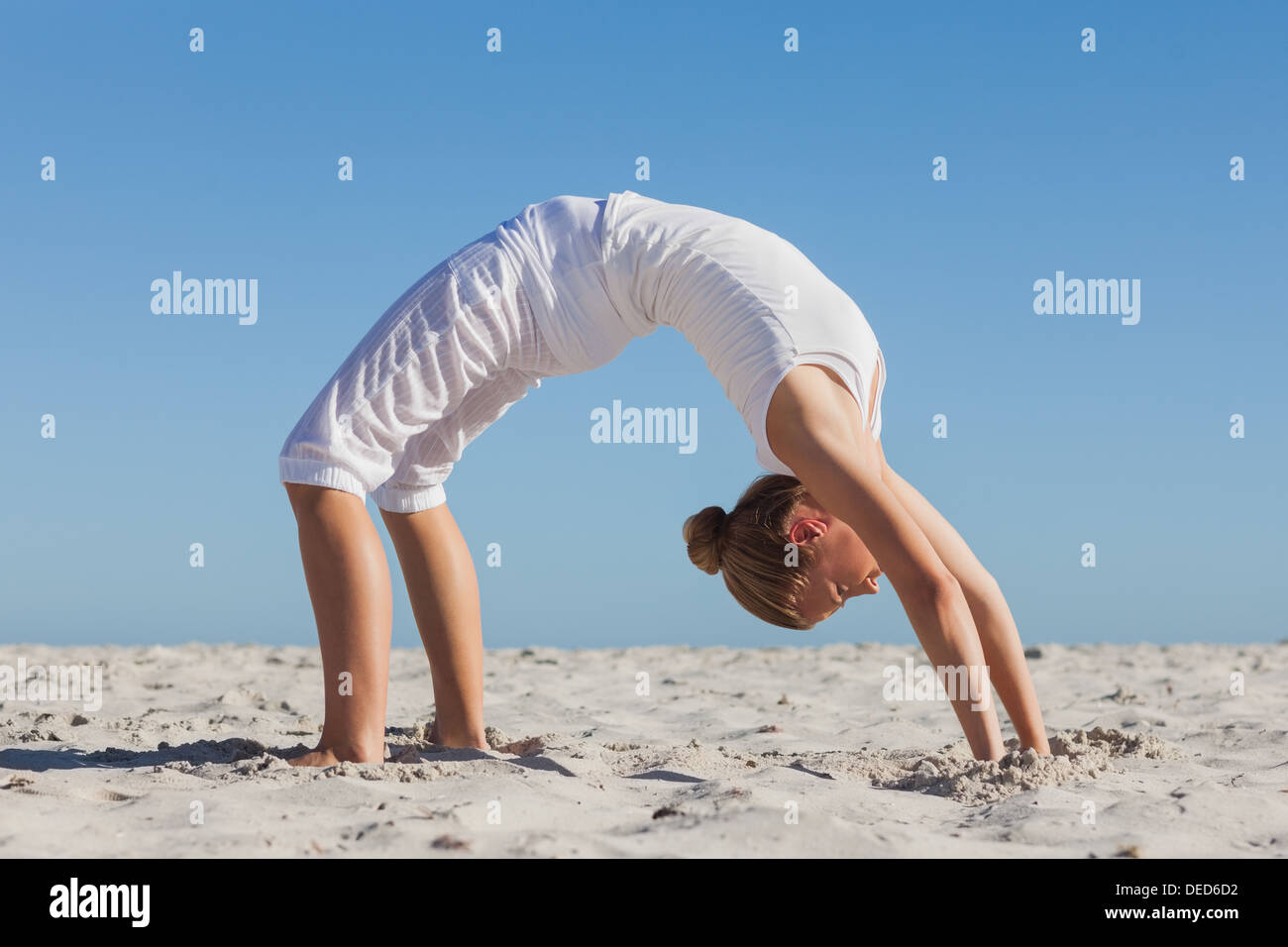 Woman doing crab yoga pose Stock Photo Alamy