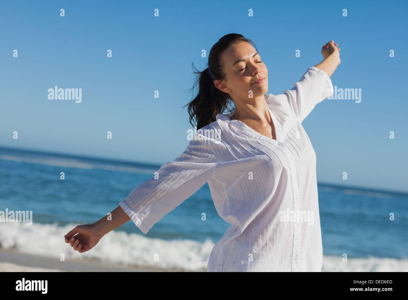 Calm woman stretching Stock Photo