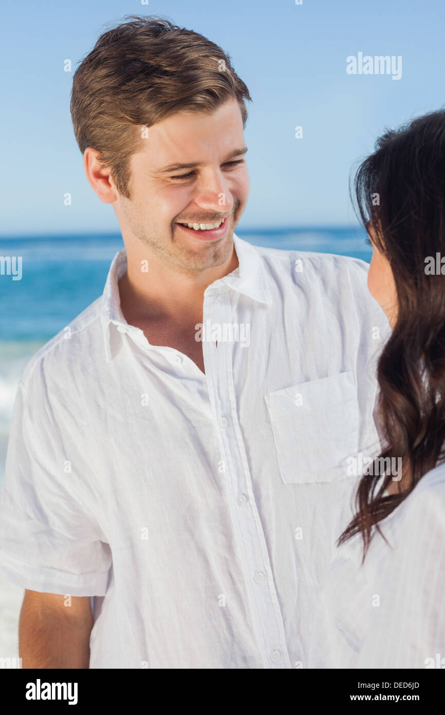 Man smiling at partner Stock Photo