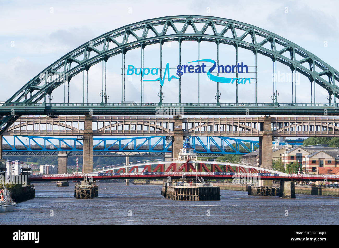 Tyne bridges Newcastle, with Bupa Great North Run logo, north east England, UK Stock Photo
