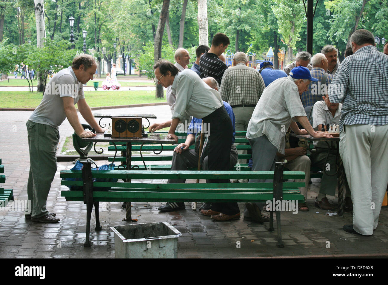 Men play chess in the park. Odessa, Ukraine. Stock Photo