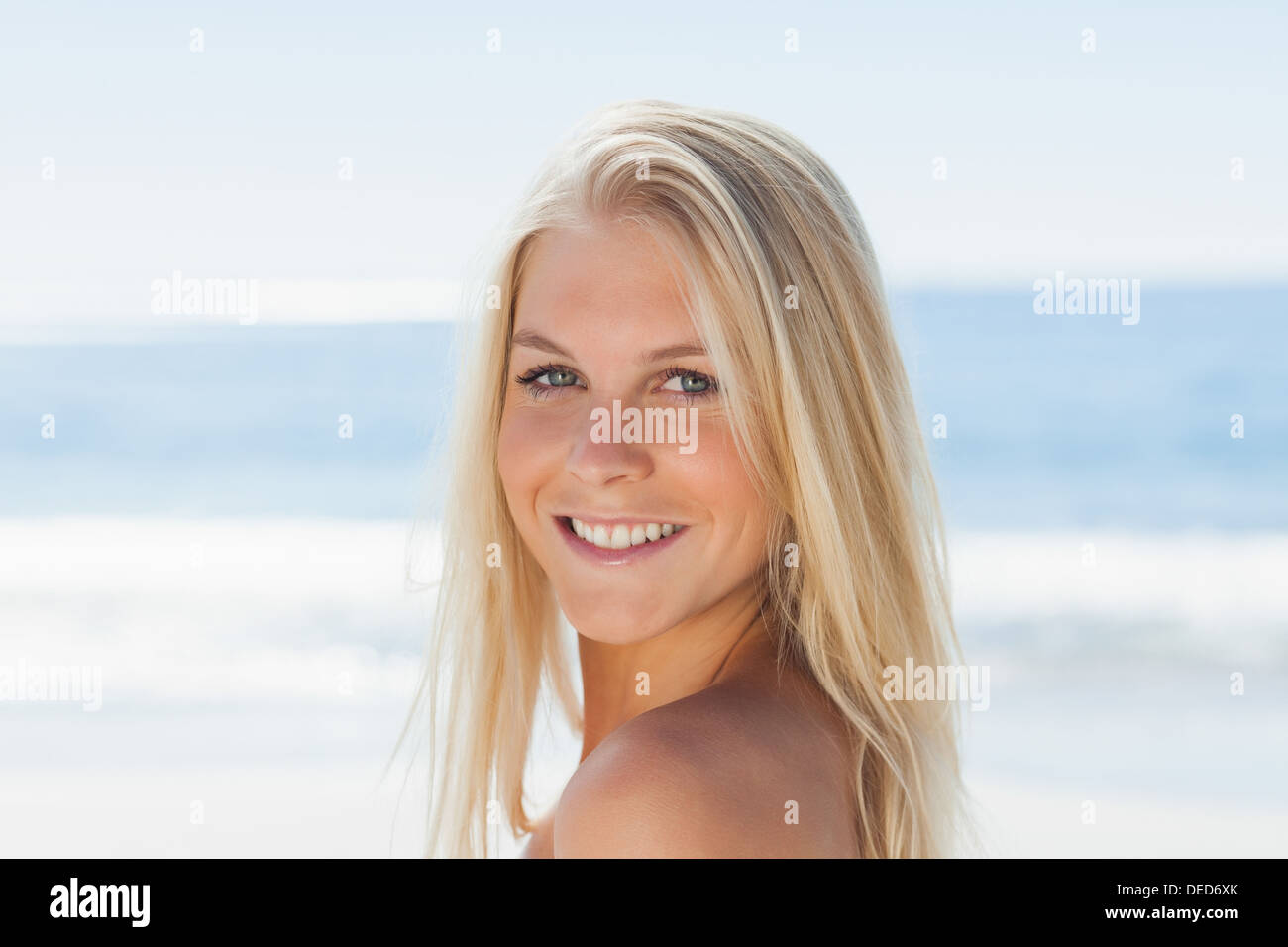Blond woman smiling hi-res stock photography and images - Alamy