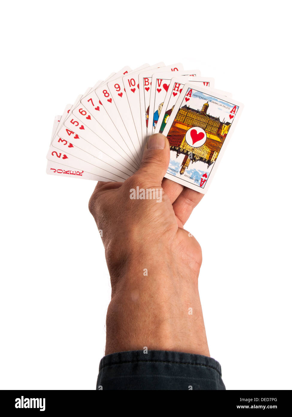 playing cards in hand as a background Stock Photo