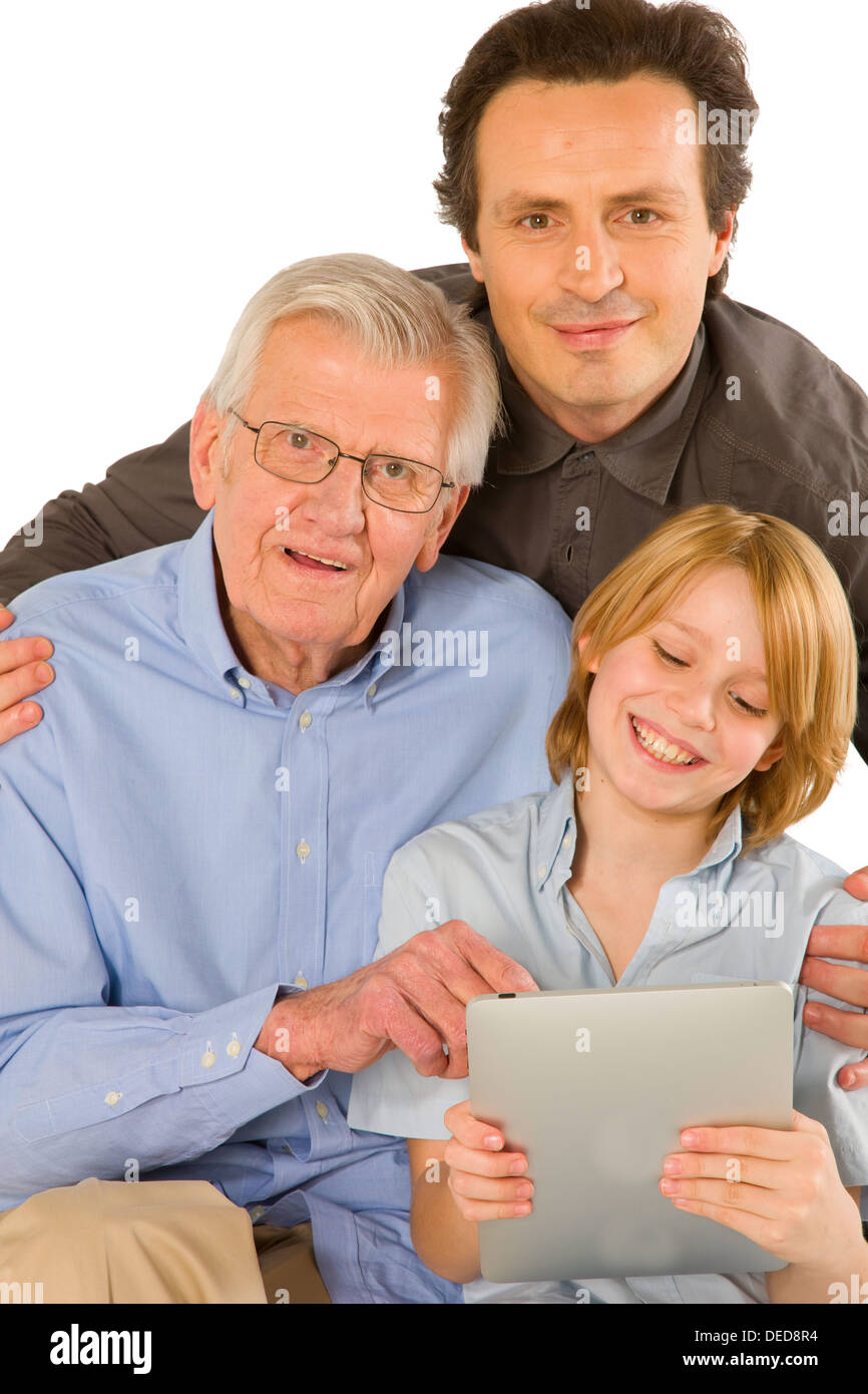 family using pc tablet Stock Photo - Alamy