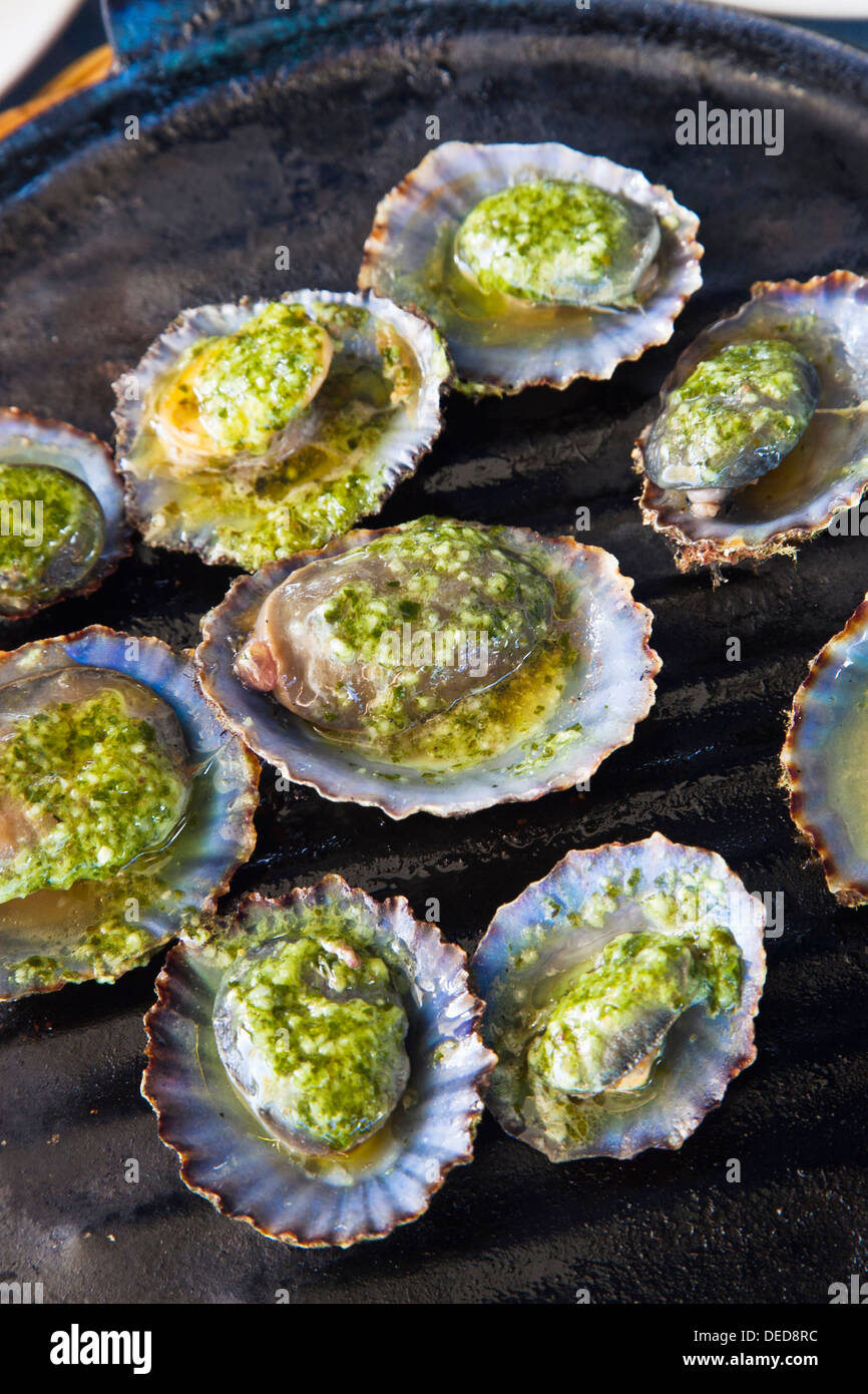 Limpets with green mojo, typical gastronomy, Lanzarote, Canary Islands, Spain Stock Photo
