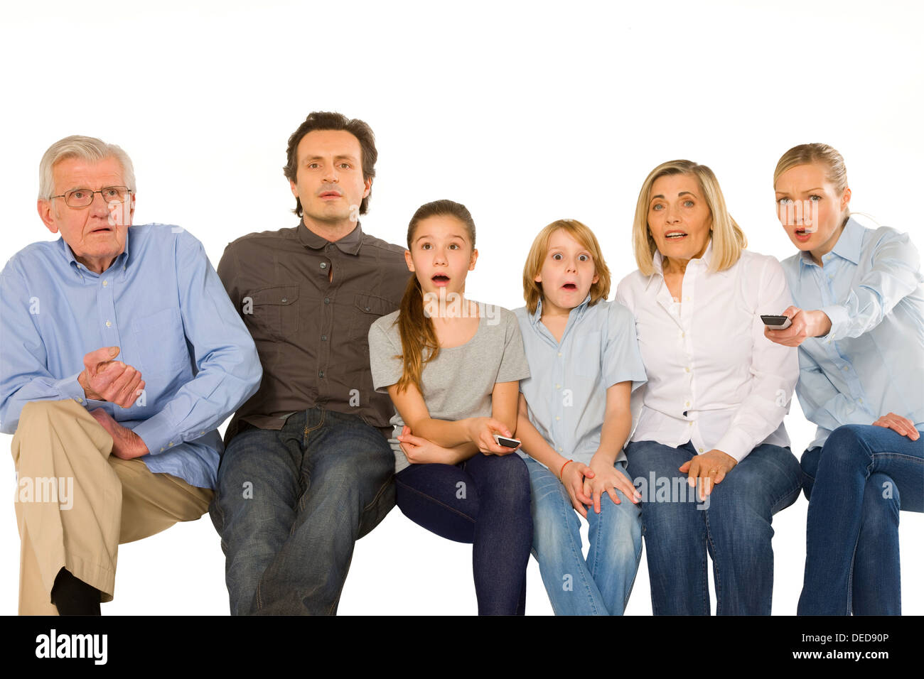 family watching tv Stock Photo