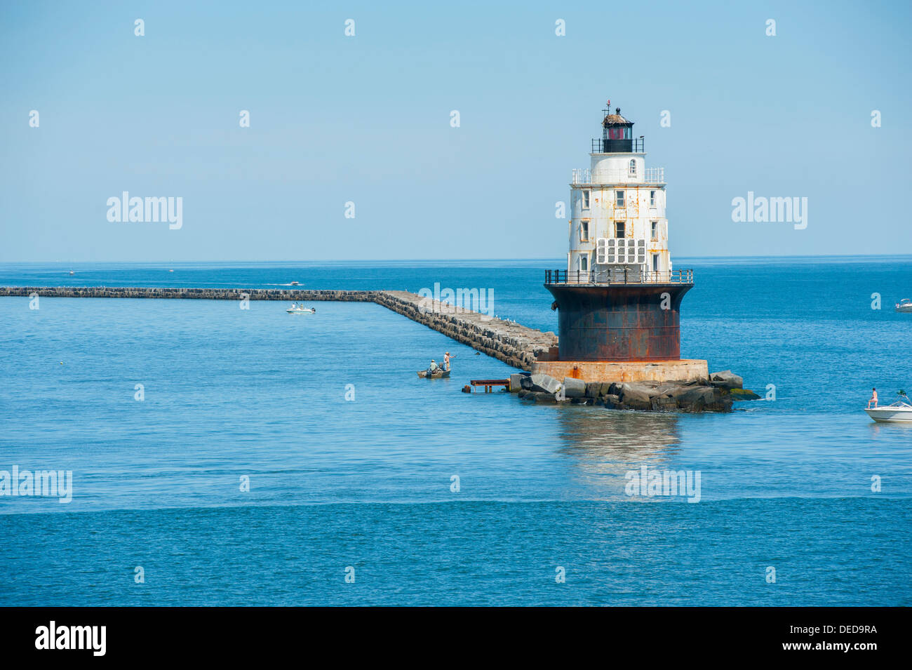 Delaware DE USA Harbor of Refuge Lighthouse in the Delaware Bay near Cape Henlopen fitted with solar panels sits on a breakwater Stock Photo