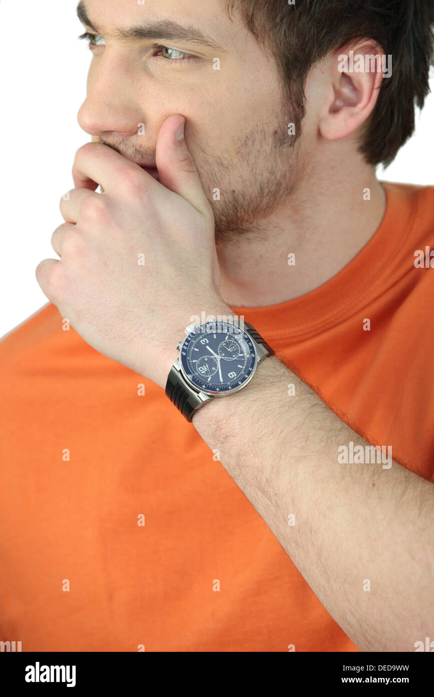 portrait of young man looking worried Stock Photo