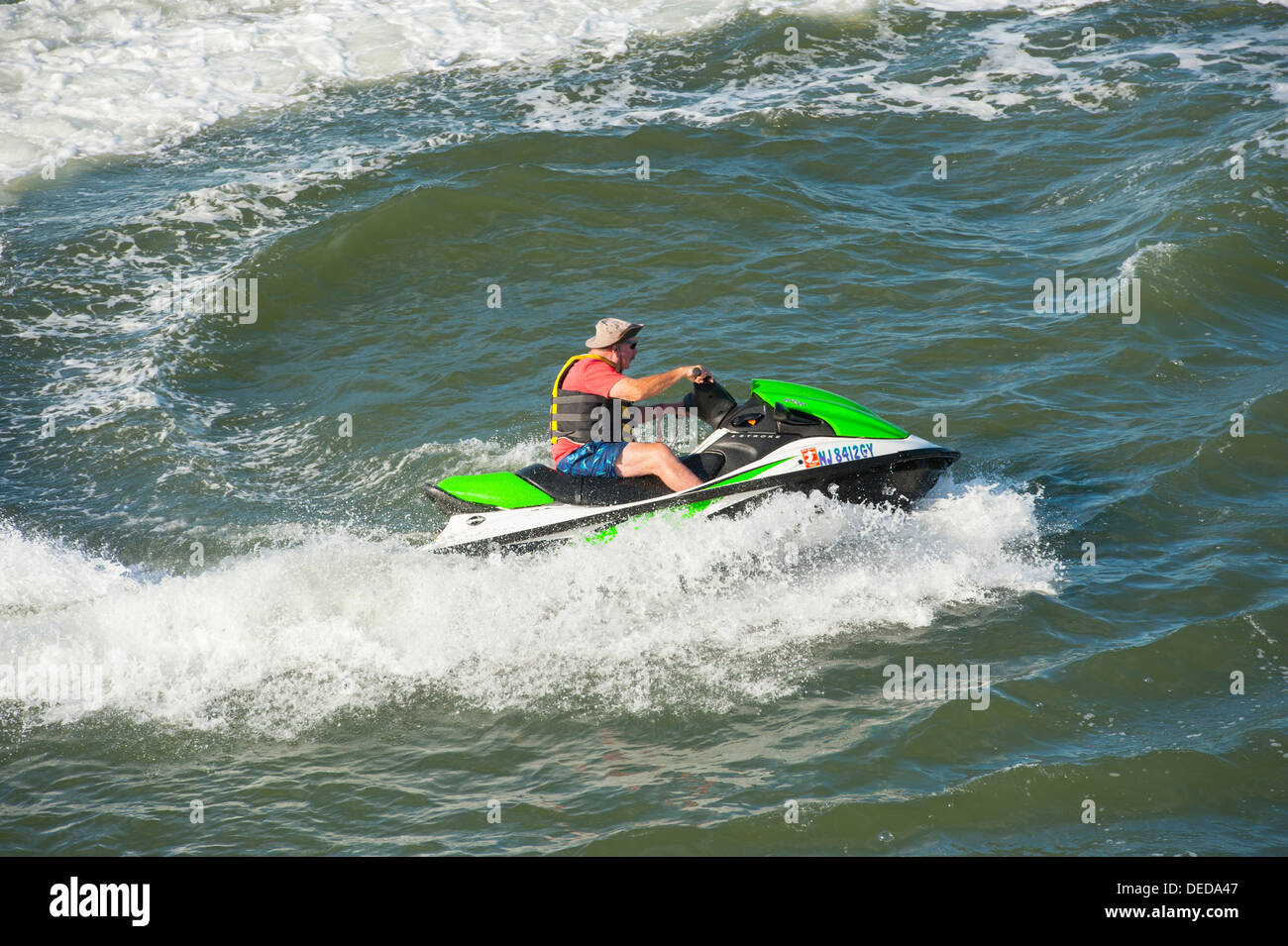 USA New Jersey NJ wave runners or jet skis riding in the bay waters between Cape May and Wildwoods Stock Photo