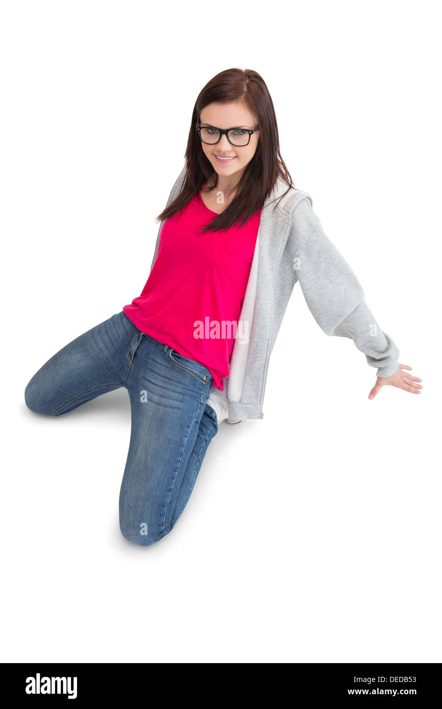 Cheerful young woman making hip hop pose Stock Photo