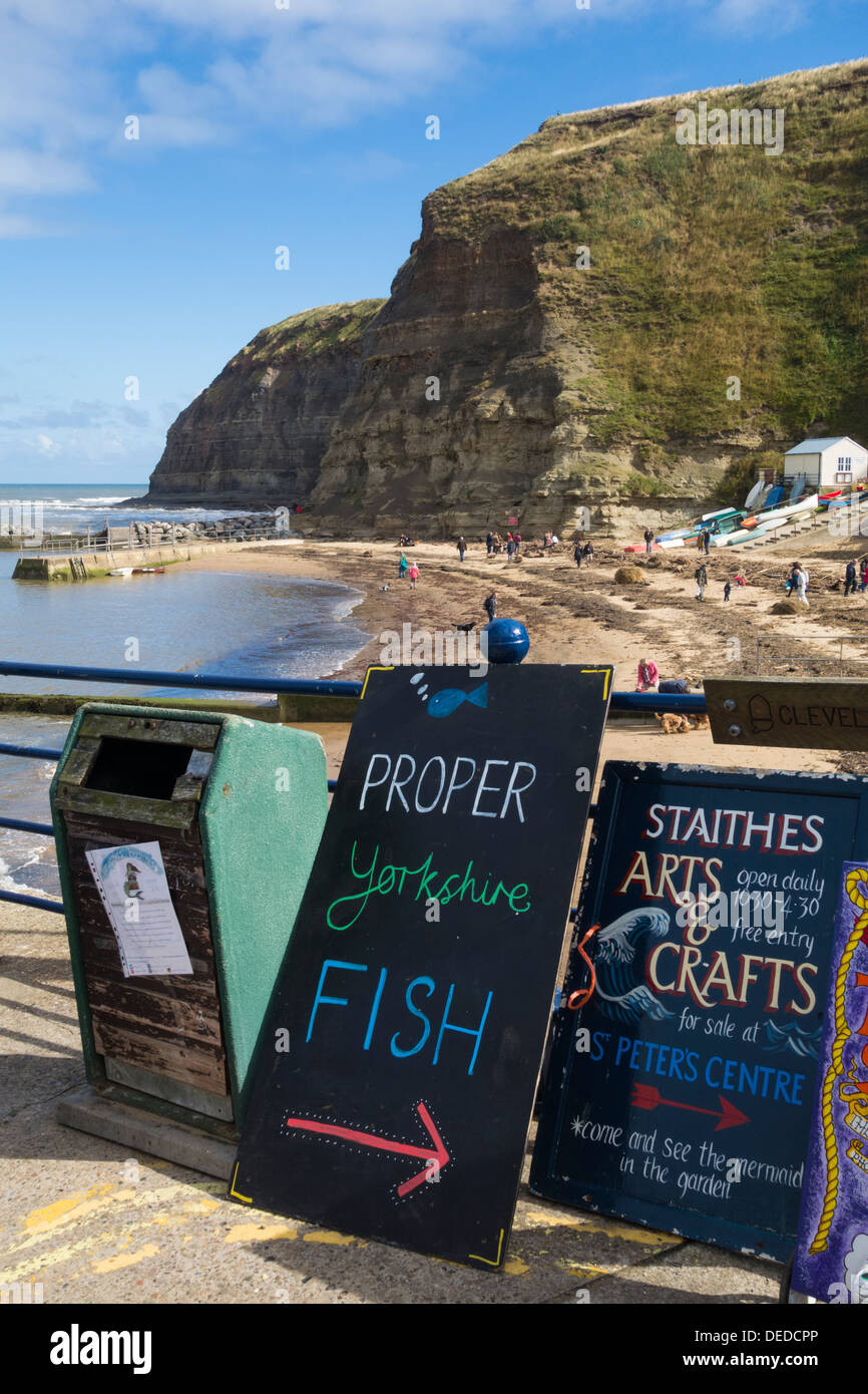 'Proper Yorkshire Fish' sign at Staithes, North Yorkshire, England, UK Stock Photo