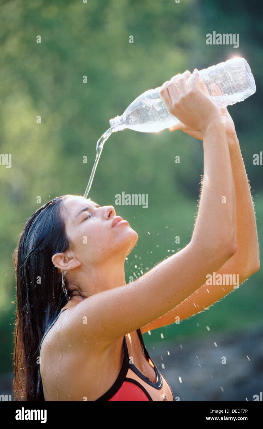 Woman pour water head hires stock photography and images Alamy